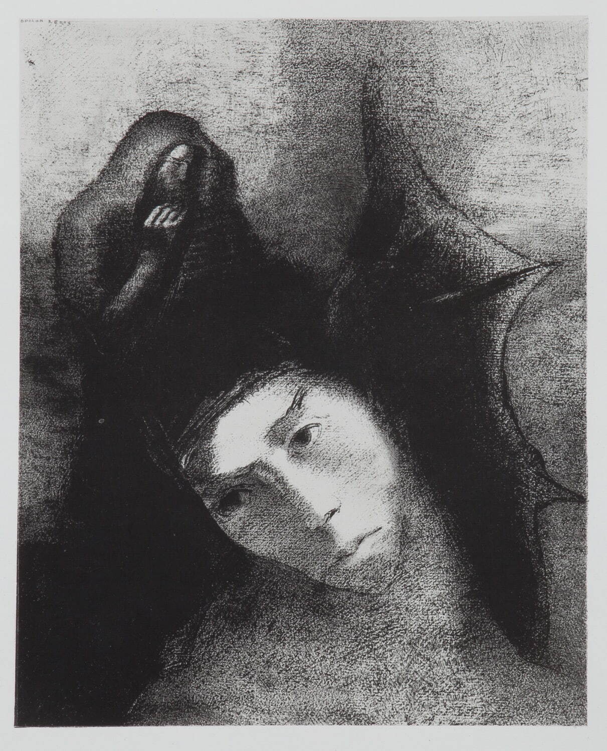 オディロン・ルドン 「聖アントワーヌの誘惑」第3集より
《18. アントワーヌ:これらすべての目的は何だろう? 悪魔:目的などはないのだ!》
1896年 和歌山県立近代美術館蔵