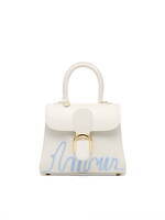 デルヴォー“ルネ・マグリット”のアート着想バッグ、りんごのレザーポーチ＆刺繍を配したハンドバッグ｜写真7