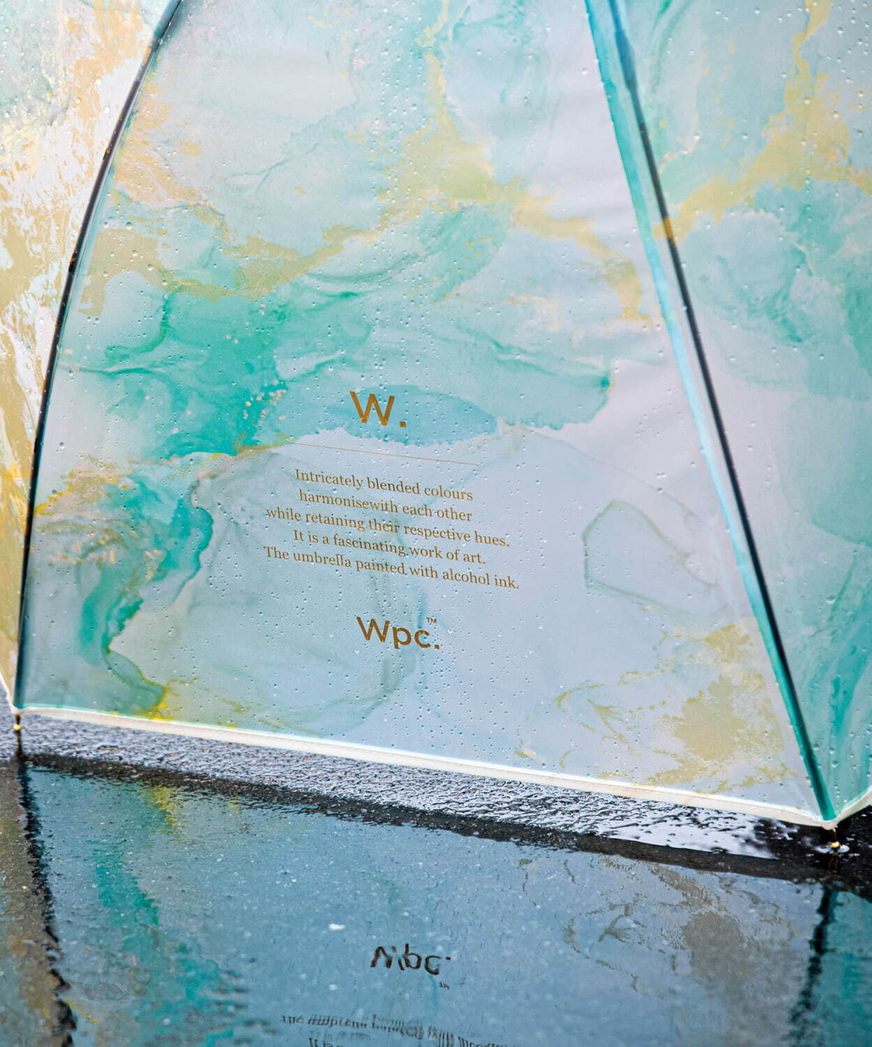 Wpc.“アルコールインクアート”着想の新作ビニール傘、ゴールドと混ざり合う幻想的な滲み風カラーで｜写真5