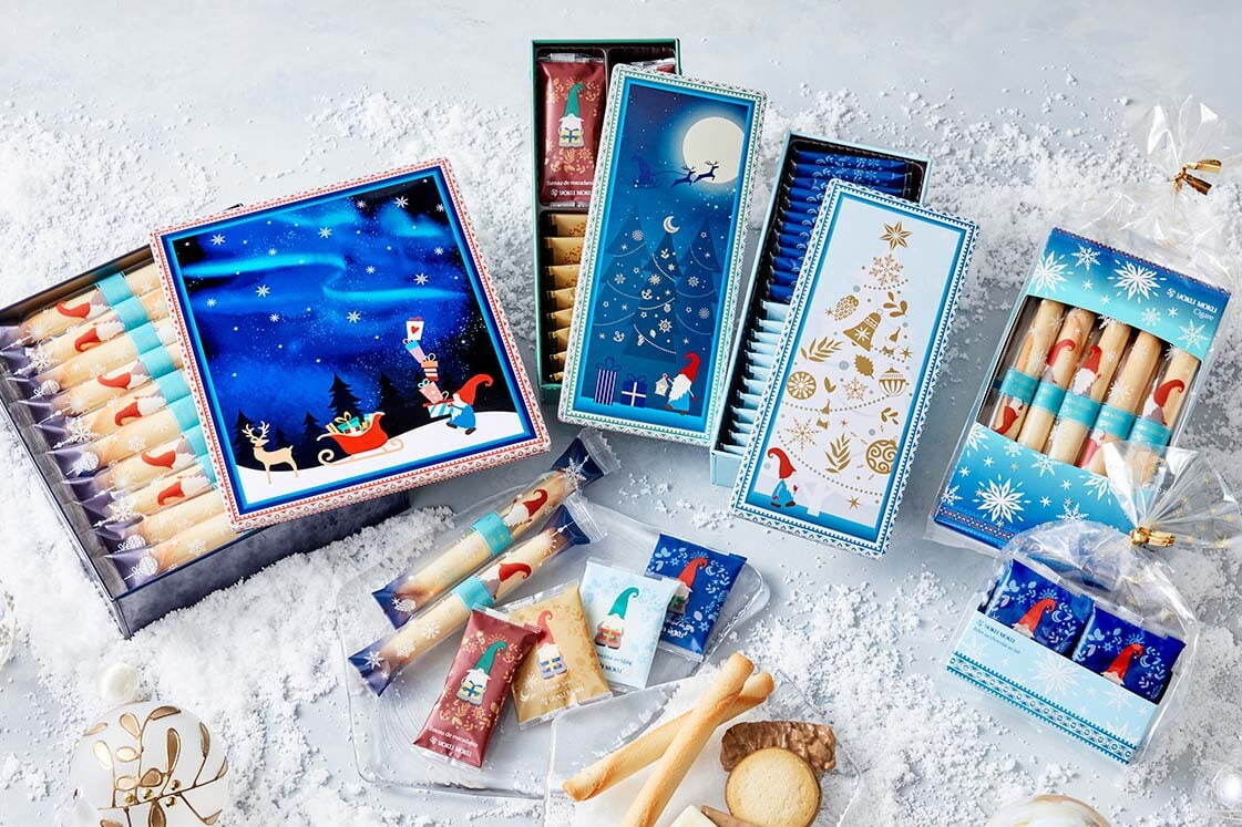ヨックモックのクリスマス限定缶クッキー＆シガール、賑やかなパーティーやサンタを描いて