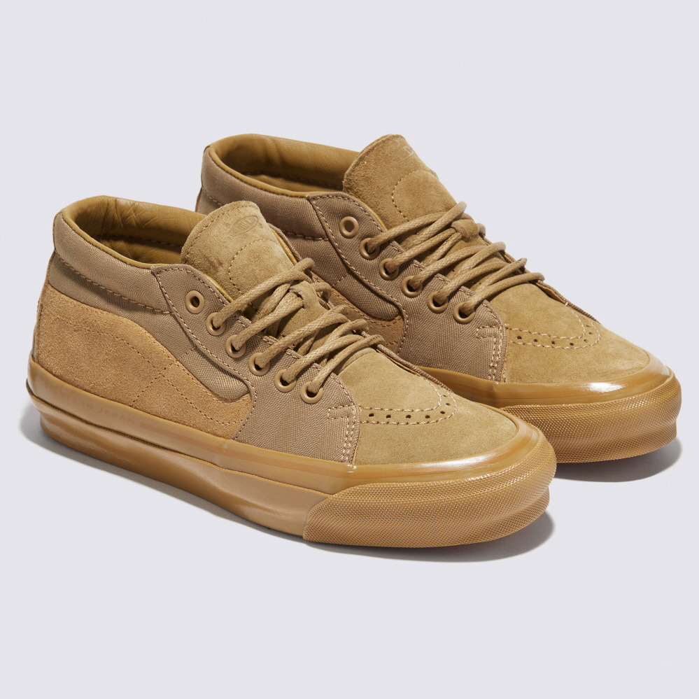 VANS“異素材”重ねのチェッカーボード柄スニーカー「スケート