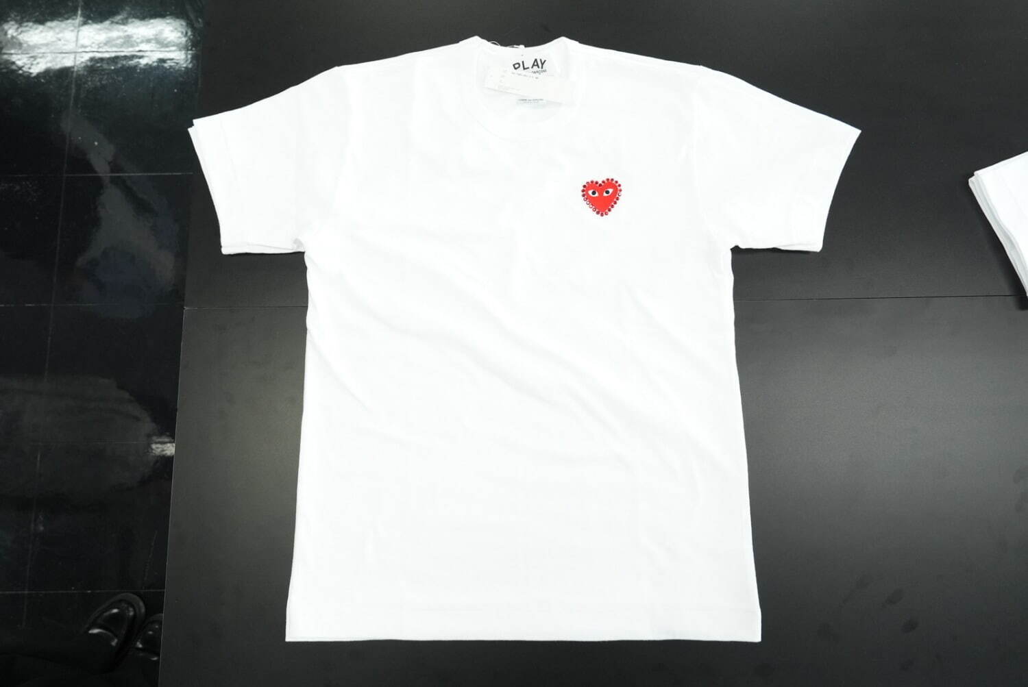 プレイ・コム デ ギャルソン“ハート”モチーフのTシャツ プレイ・コム デ ギャルソン“ハート”モチーフのTシャツ