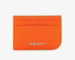 マックイーンより“アシンメトリー”なレザーカードケース、男女兼用のオレンジやブラックで｜写真1