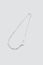 ミカゲシン"曲線カットライン"の限定ショート丈コート＆惑星着想のイヤカフなど｜写真2