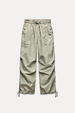 ZARA×アンドワンダー初のウィメンズウェア、中綿ロングコート＆軽量レインウェアなど｜写真13