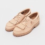 エンダースキーマとティンバーランドが初コラボ、“メダリオン入りキルト”のレザーデッキシューズ｜写真1