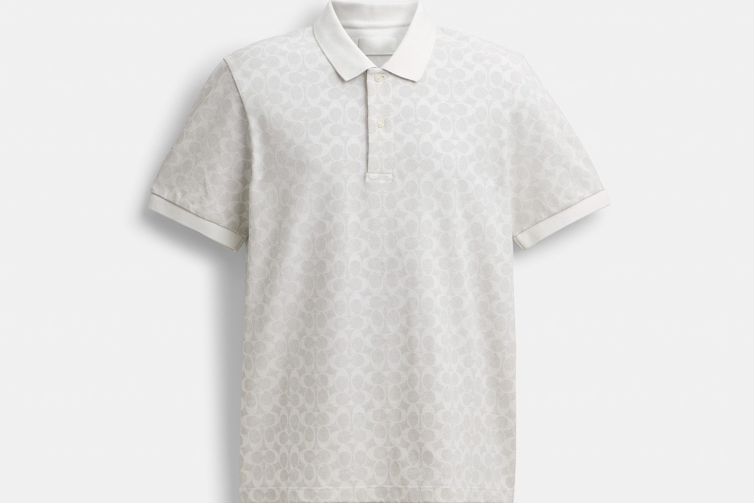 長袖シャツ｜コーチ“真っ白”な25年春メンズウェア、恐竜「レキシー」Tシャツやシグネチャー総柄ポロシャツなど