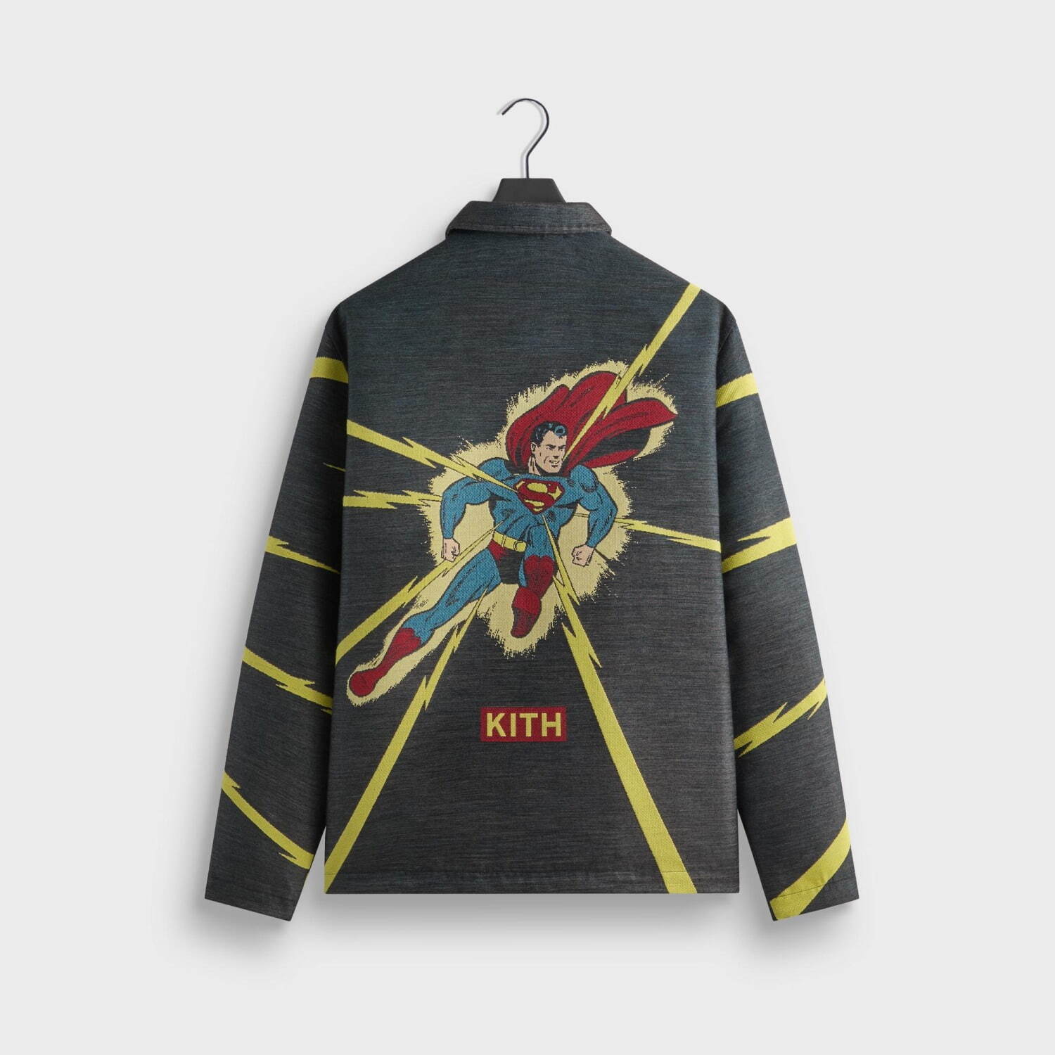 Kith「スーパーマン」着想ウェア、Sシールド付きブルゾン