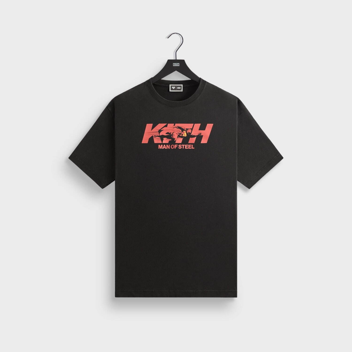 Kith「スーパーマン」着想ウェア、Sシールド付きブルゾン
