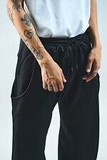 ネヴァーフォーゲット×ウィズムのワイドパンツ、ダイナミックにU字を描くシームポケット｜写真11