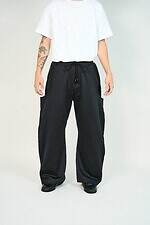 ネヴァーフォーゲット×ウィズムのワイドパンツ、ダイナミックにU字を描くシームポケット｜写真2