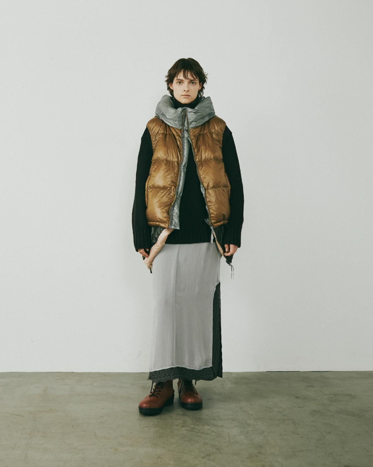 「マルチレイヤリングダウンベストブルゾン」165,000円
