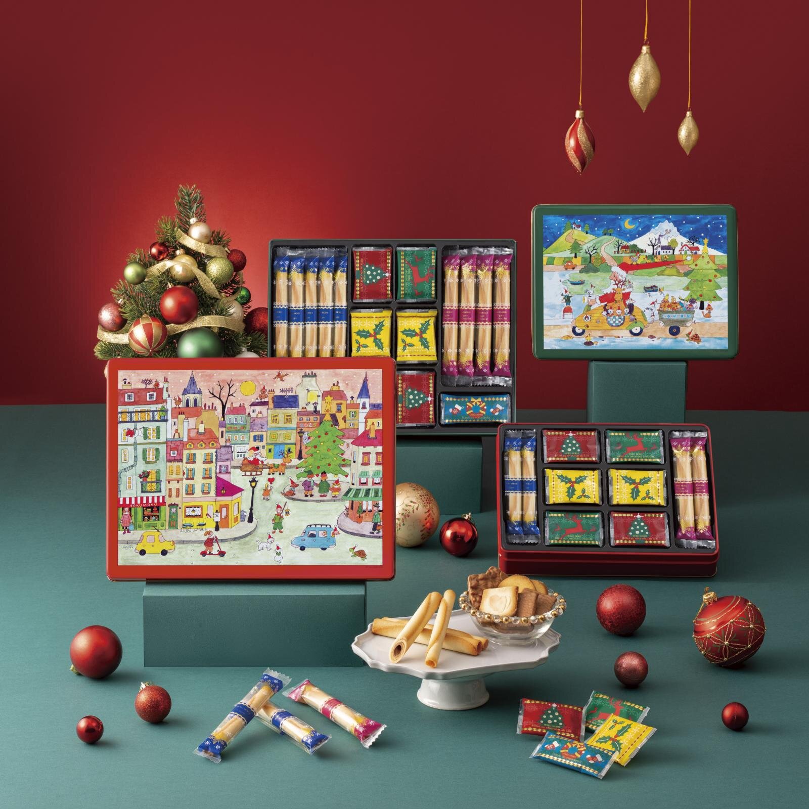 ヨックモック25年クリスマス限定クッキー＆シガール缶、“サンタや妖精”描いた年号入りデザイン｜写真1