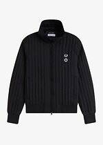 フレッドペリー×クレイグ グリーン、“ホワイトとグリーン”の切り替えポロシャツ＆撥水ジャケット｜写真1