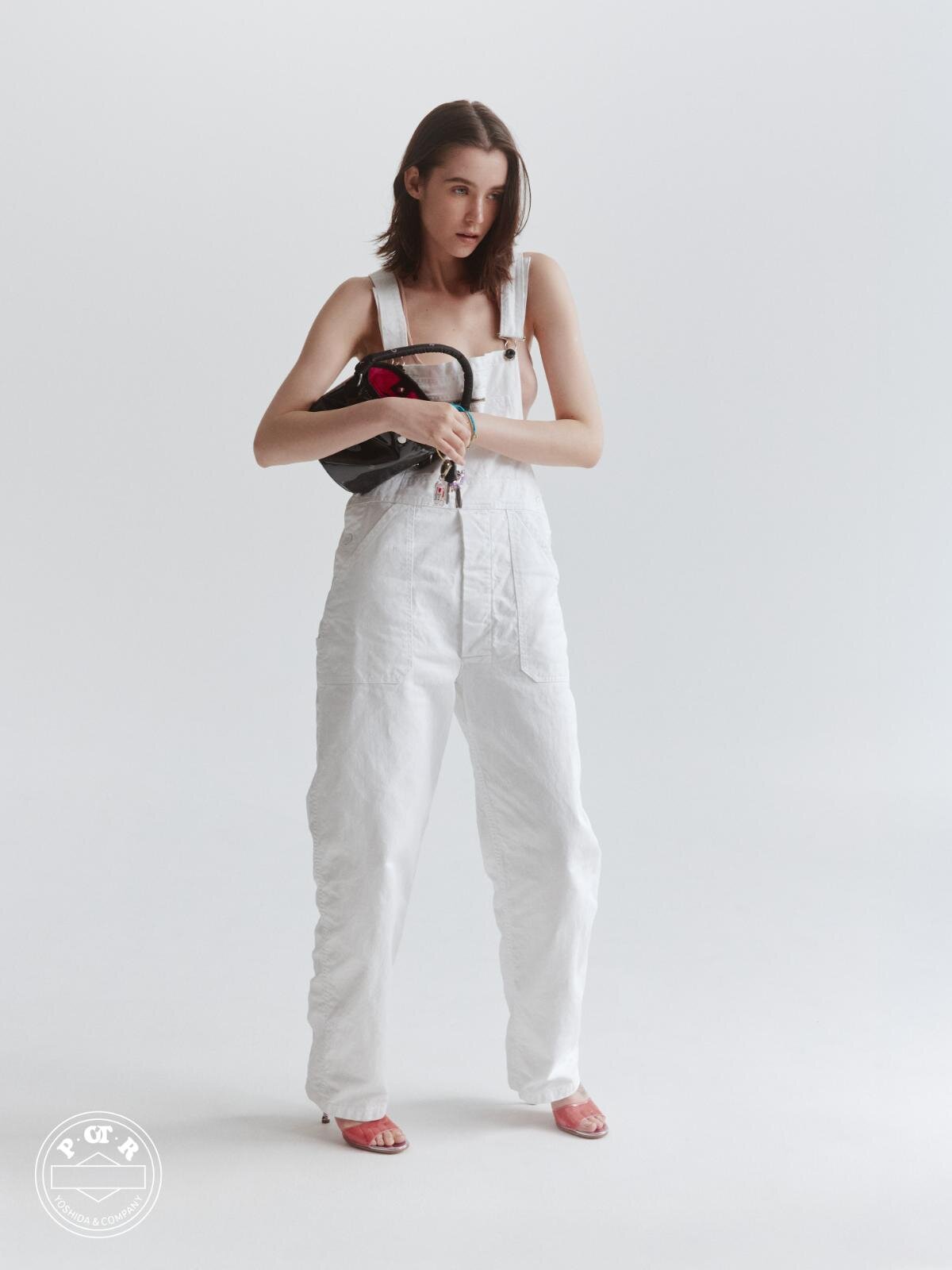 POTR“グロッシー”なハンドバッグ＆円筒型バッグ、鮮やかなピンクの裏地で｜写真17