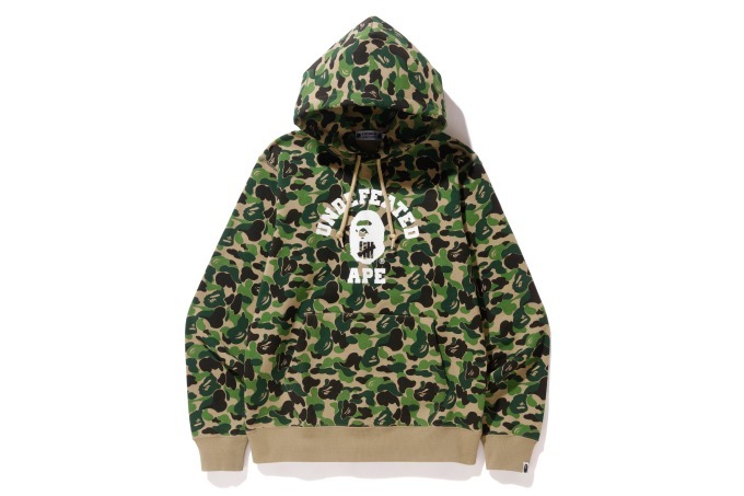 アンディフィーテッド×ベイプ、カモ柄ベースのコラボパーカー発売