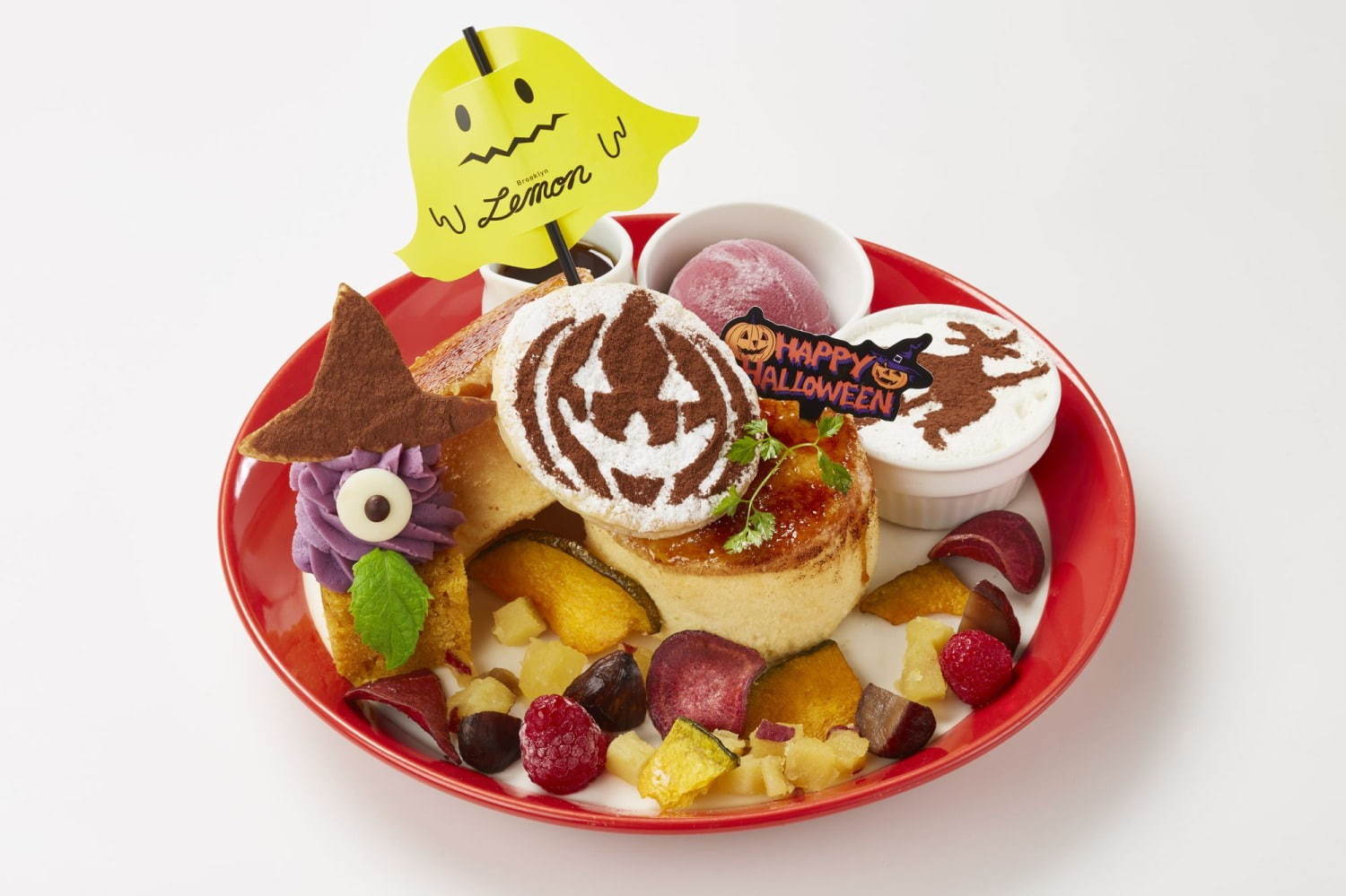 パンケーキ専門店バター「秋の味覚 焦がしハロウィンパンケーキ」紫芋のクリームのおばけをトッピング | 写真