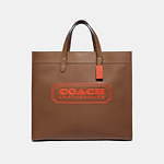 COACH オレンジ ビジネスバッグ コーチの人気ビジネスバッグ「フィールド トート」オレンジロゴ