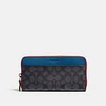 コーチからカラーブロックのメンズ革小物、ポケット収納し易いLジップのカードケースやスマホも入る長財布｜写真5