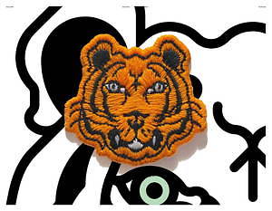 ケンゾー“タイガー”の立体刺繍入りフーディやTシャツ、オーガニック 