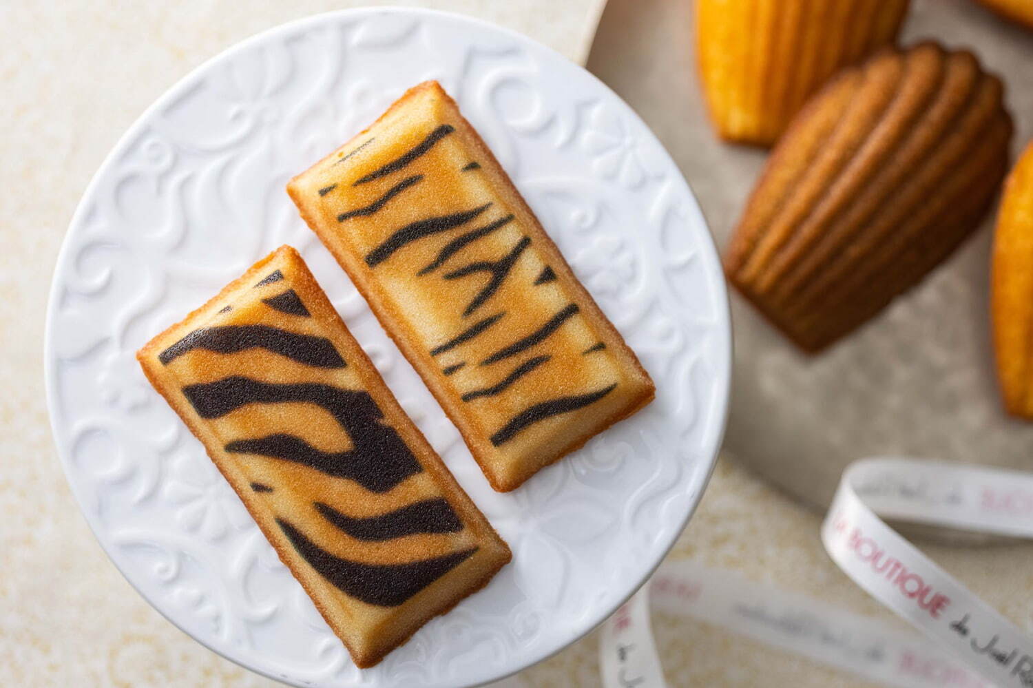  ジョエル・ロブション 虎ノ門ヒルズ店から“虎柄”の限定フィナンシェ、開業1周年を記念して