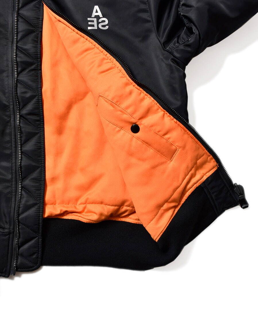 マインデニムからウィンダンシーの反転ロゴ入りジャケット、裏地にオレンジデニムを配したMA-1｜写真3