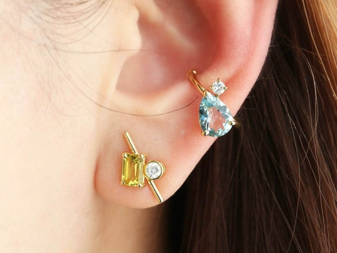 左から) ピアス(K18, カナリートルマリン, ダイヤモンド) 110,000円
イヤーカフ(K18, アクアマリン, ダイヤモンド) 154,000円