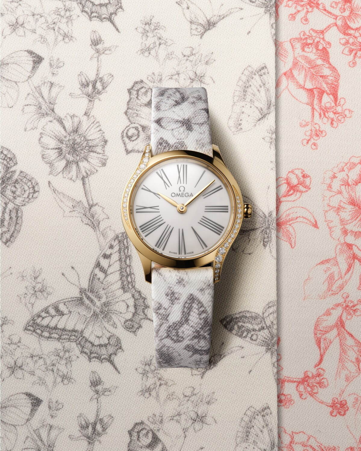 オメガ「トワル・ドゥ・ジュイ」モチーフのウィメンズ腕時計、クラゲ＆蝶模様の新作「ミニ トレゾア」 ファッションプレス