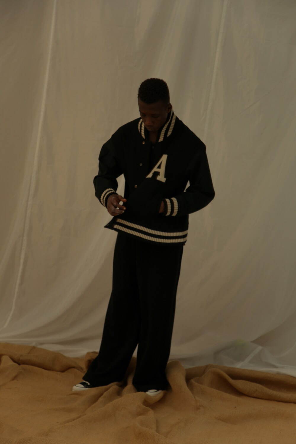 ジャケット 「SIDE SLIT VARSITY JACKET」 69,300円