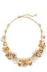 ケイト・スペードの新作ブライダル、ふんわりフェザーを配したドレス＆ボウモチーフのクラッチバッグ｜写真7