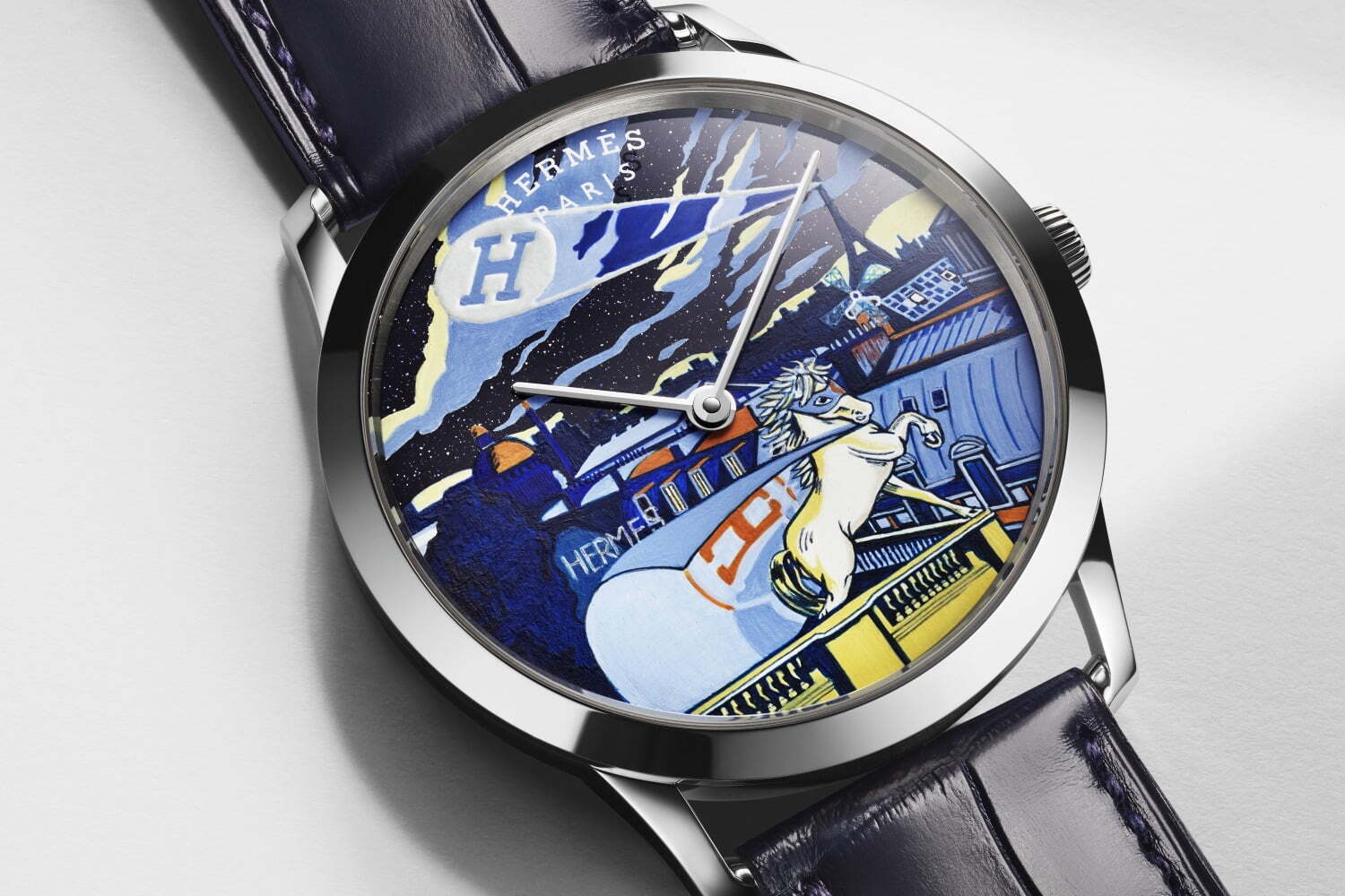 エルメスの腕時計「スリム ドゥ エルメス ミニュイ オ フォーブル」“パリと馬”を描く細密画の文字盤