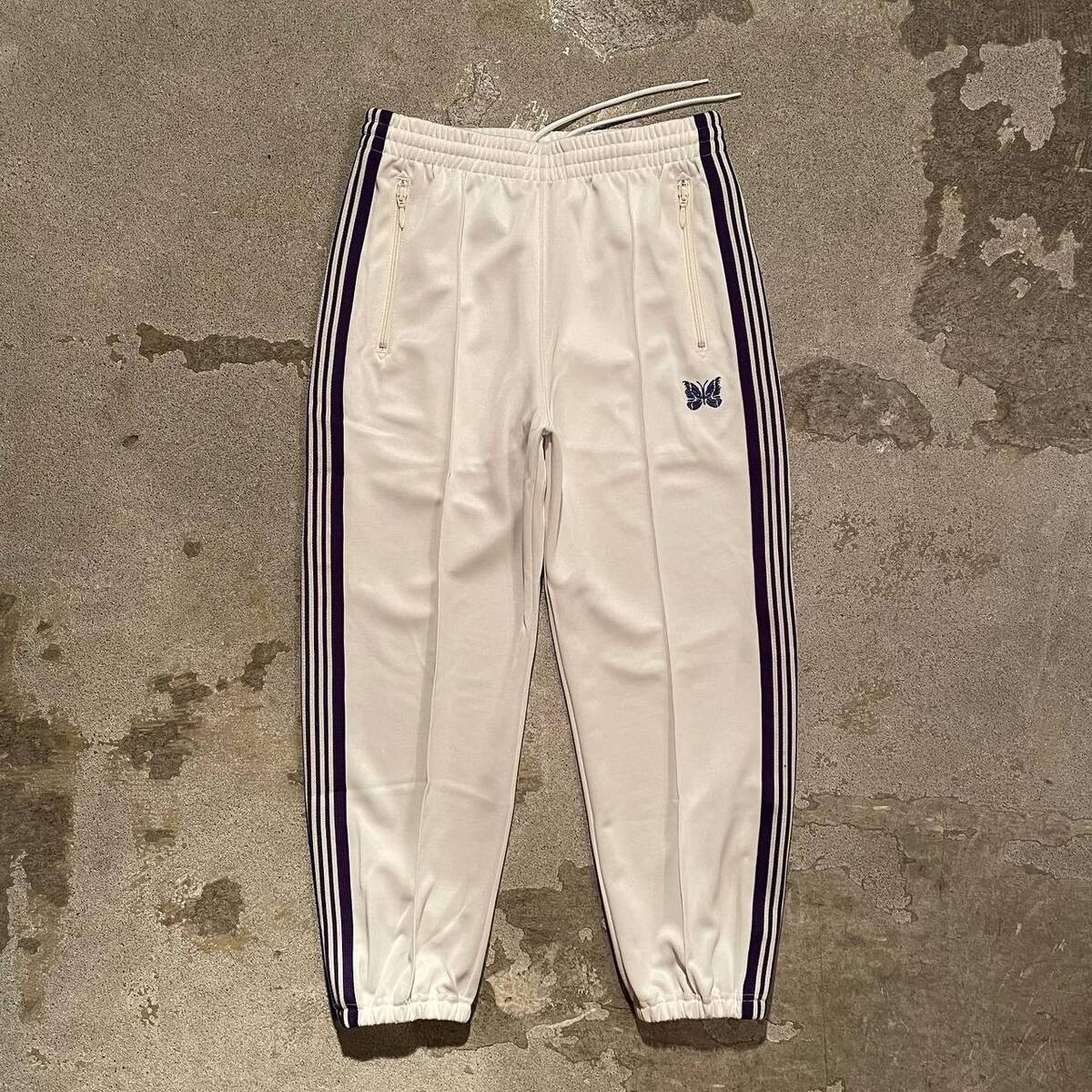 NEEDELS "Zipped Track Pant - Poly Smooth" 1